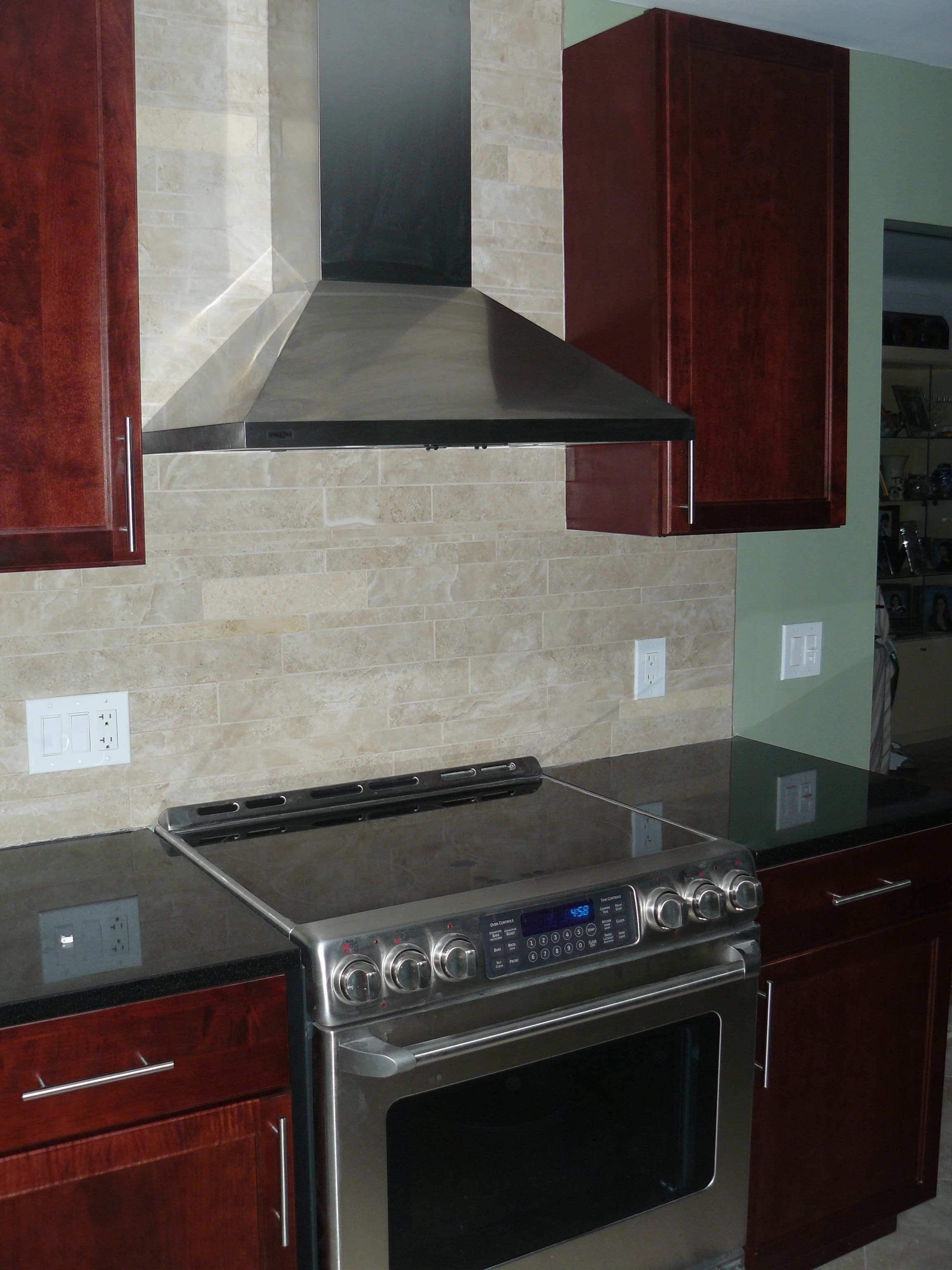 Modern kitchen with custom cabinetry and tile