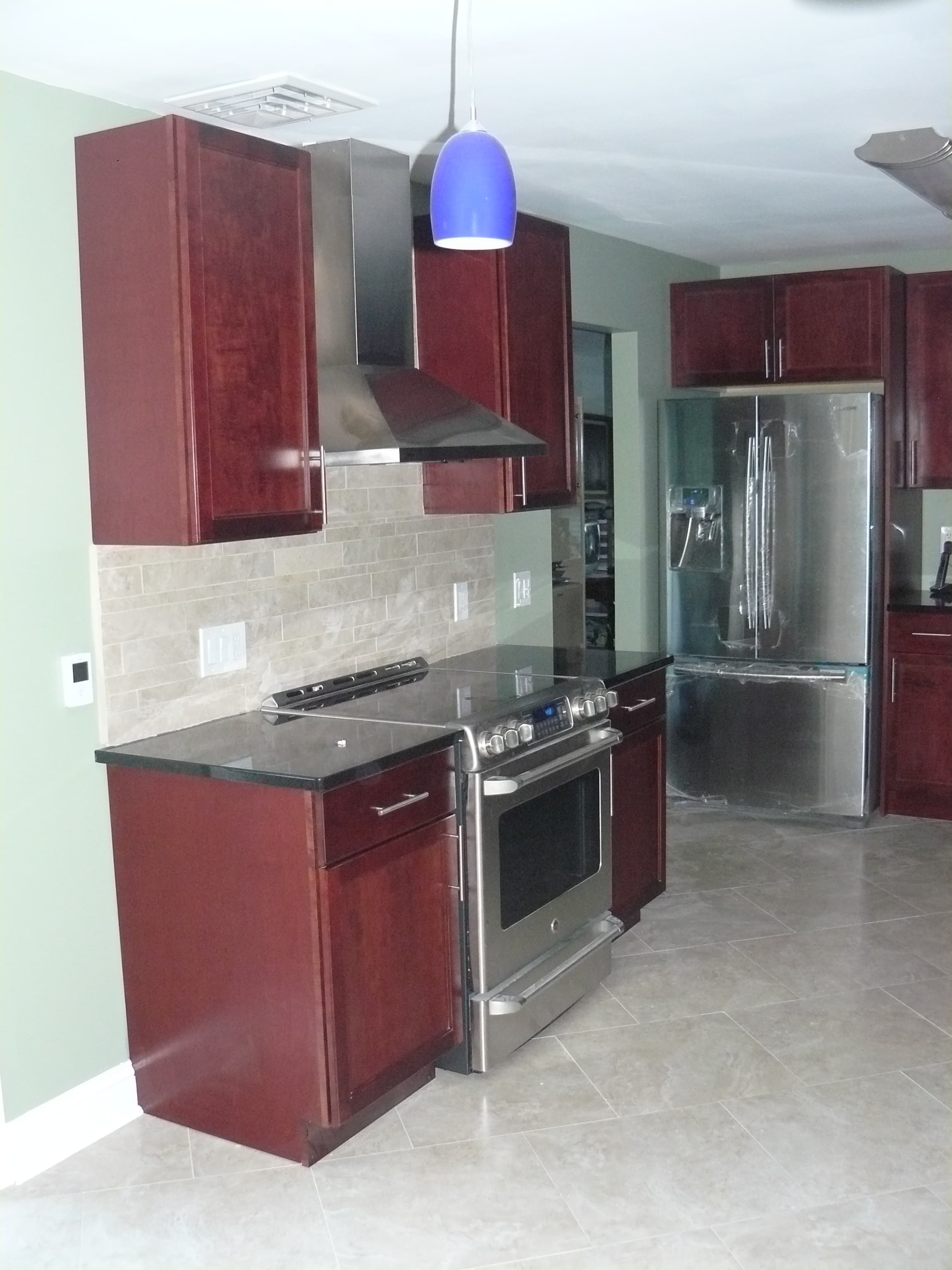 Elegant kitchen with pendant lighting