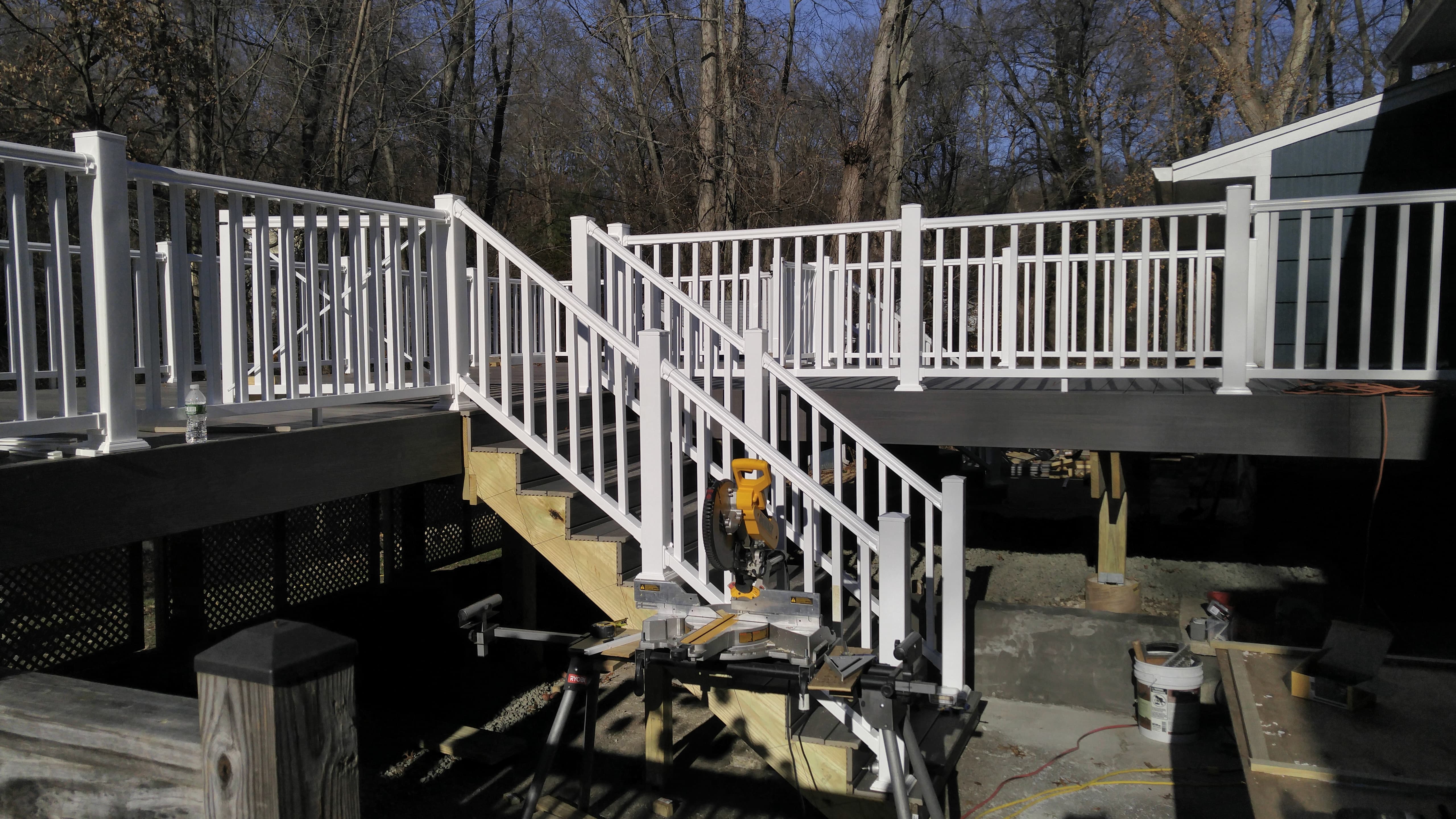 Deck construction with white stairs