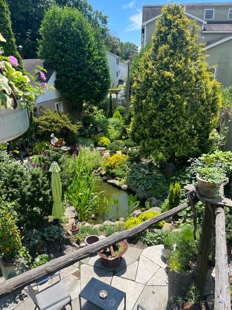 Stone patio with fire pit and outdoor seating