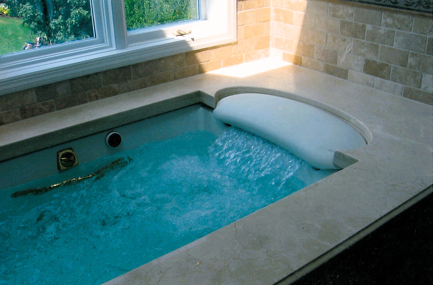 Custom bathtub with tile surround